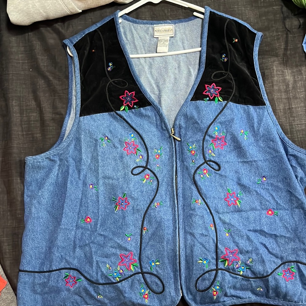Cute blue vest with flowers
